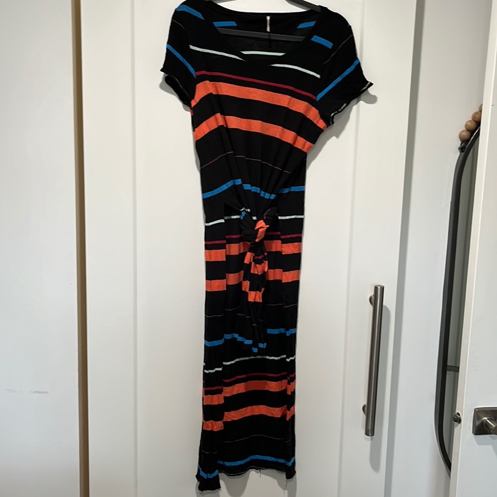 Free people knit, striped, dress/tunic with side slits to the waist.